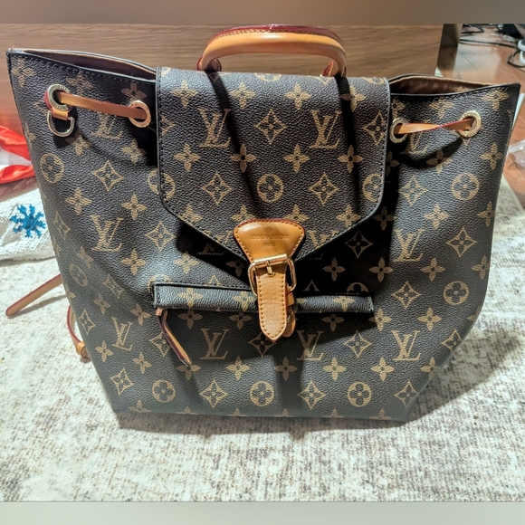 Louis Vuitton Handbags - Louis Vuitton Monogram Backpack With Front Pocket